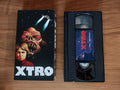 Xtro movie VHS cassette tape