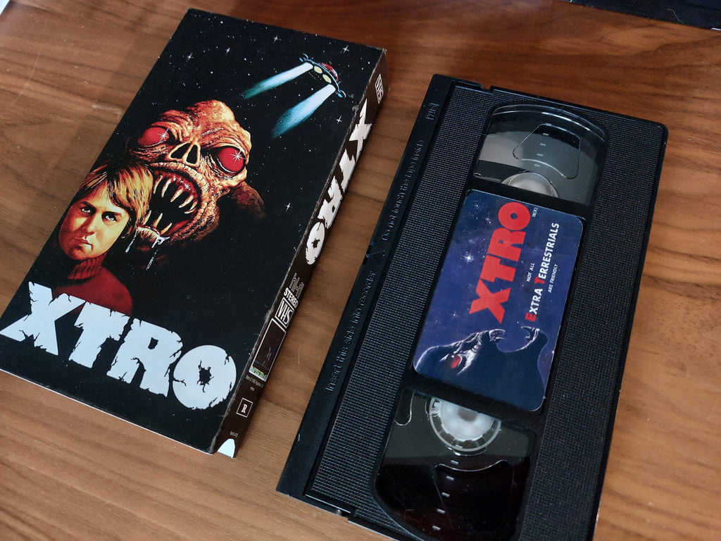 Xtro movie VHS cassette tape